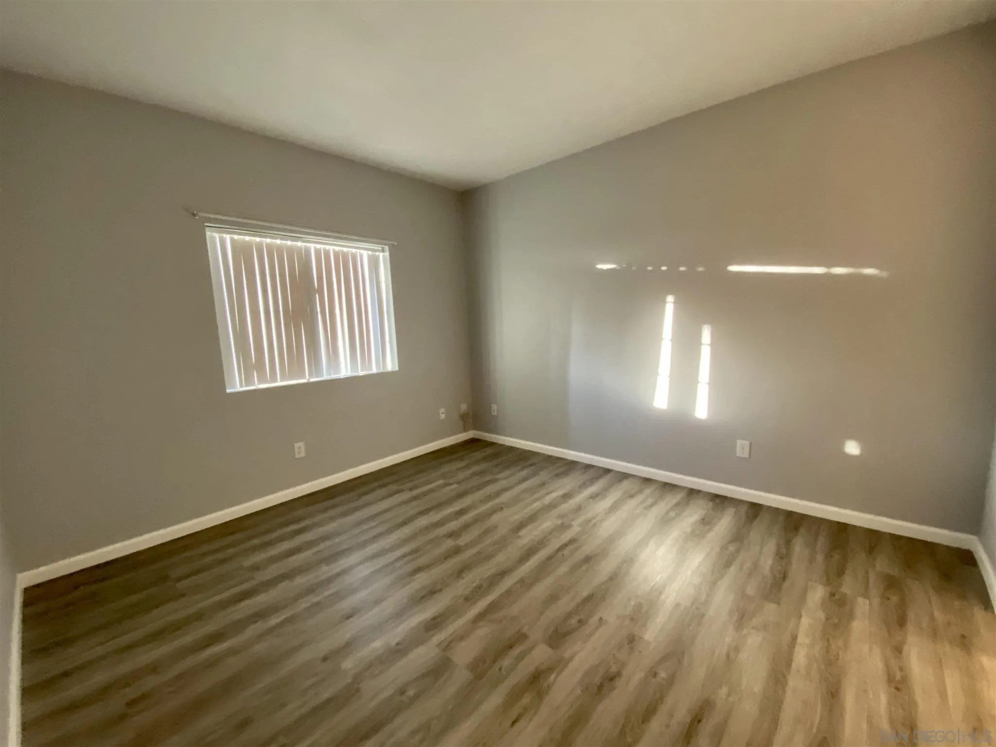 17161 Alva Road, Unit 213 San Diego, CA 92127 - Photo 29 of 48 a view of an empty room and window