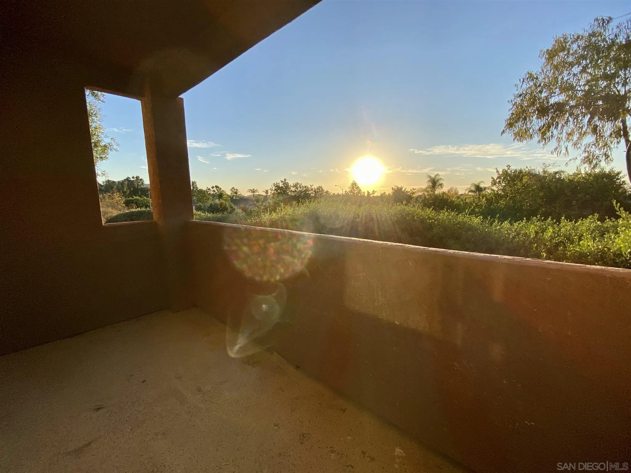 17161 Alva Road, Unit 213 San Diego, CA 92127 - Photo 32 of 48 a view of a lake from a balcony