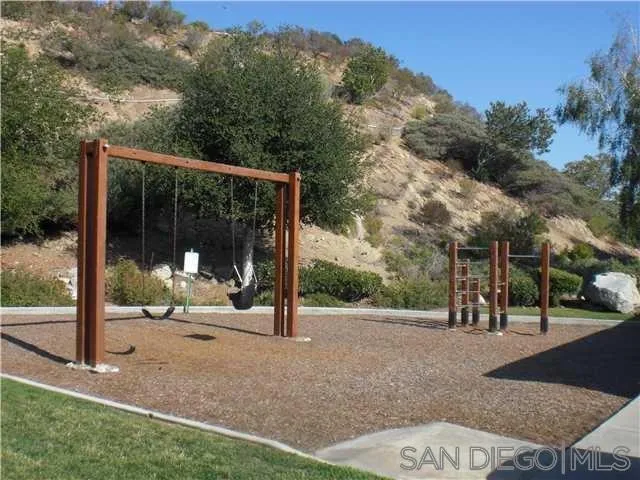 17161 Alva Road, Unit 213 San Diego, CA 92127 - Photo 44 of 48 a view of a patio with a backyard