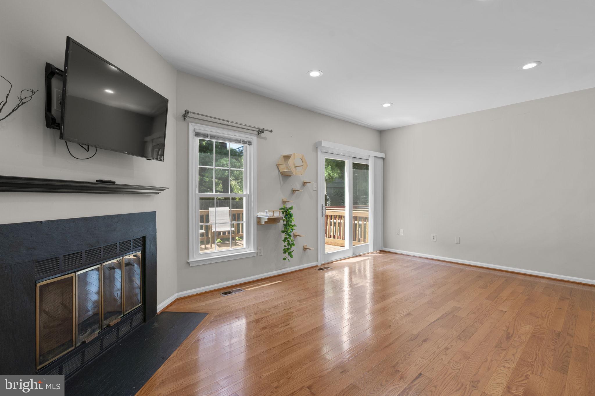 4722 Rams Horn Row Ellicott City, MD 21042 - Photo 14 of 50 Sunken living room with hardwood floors