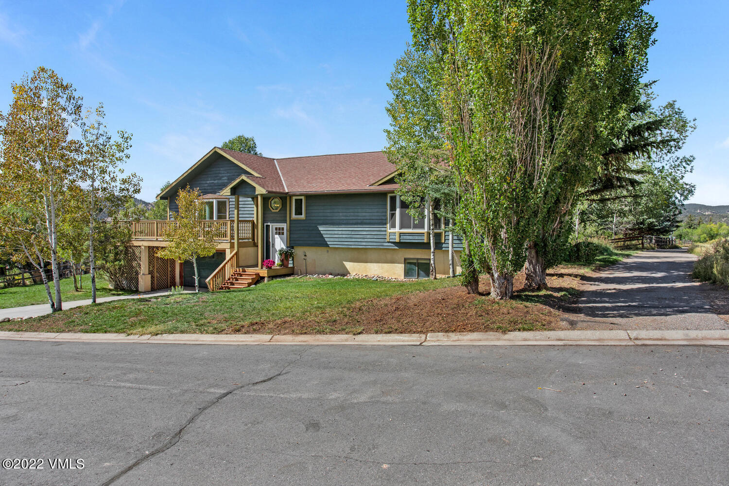 3 Canvas Back Eagle, CO 81631 - Photo 2 of 26 a front view of a house with a yard and garage