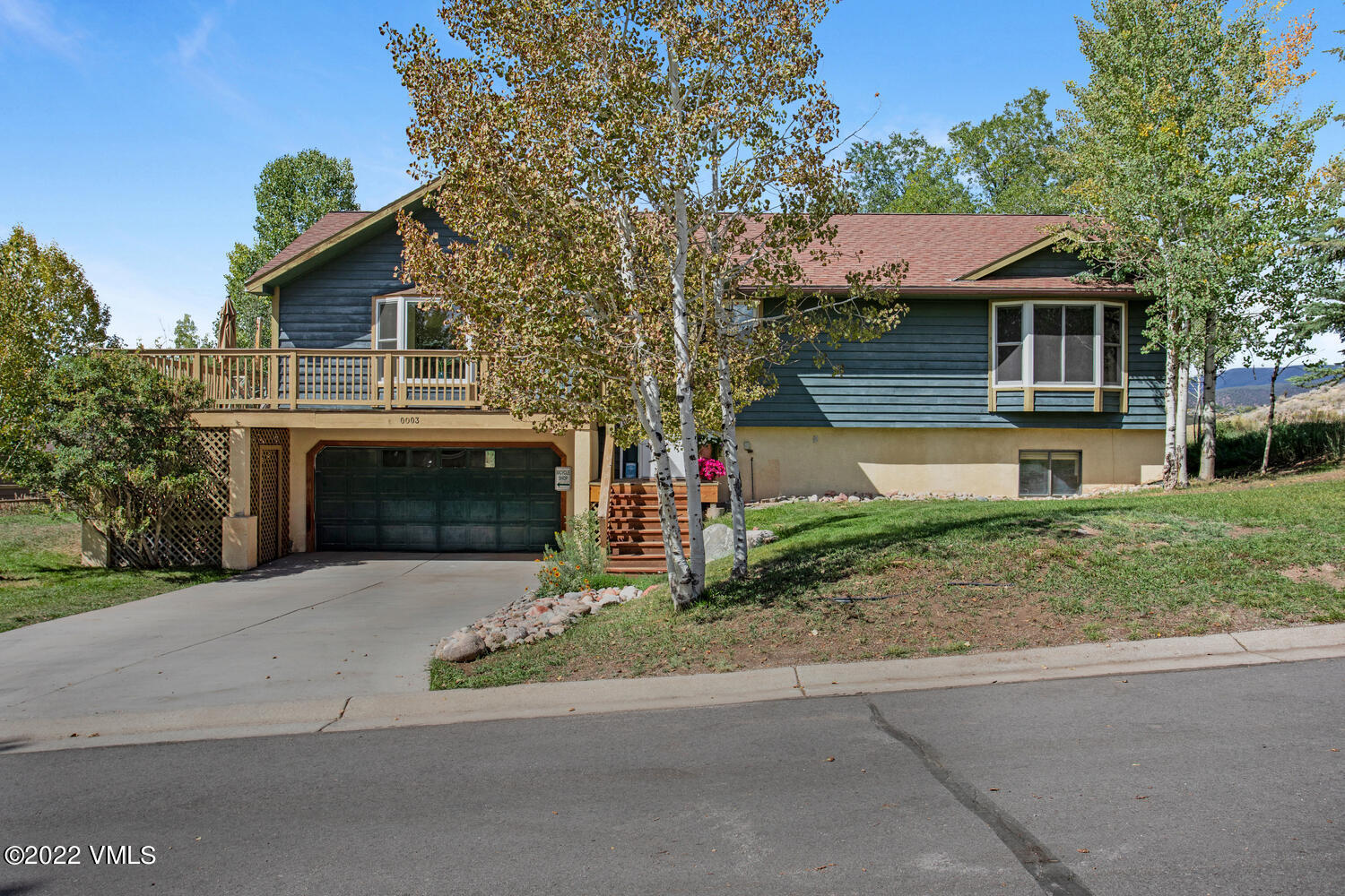 3 Canvas Back Eagle, CO 81631 - Photo 26 of 26 a front view of a house with a garden and garage