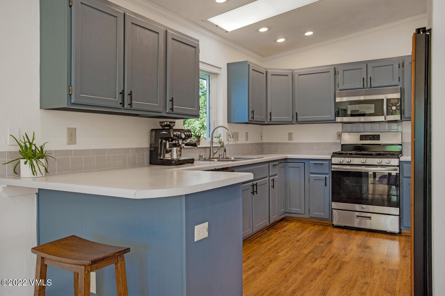 3 Canvas Back Eagle, CO 81631 - Photo 5 of 26 a kitchen with stainless steel appliances granite countertop a sink dishwasher stove and oven with cabinets