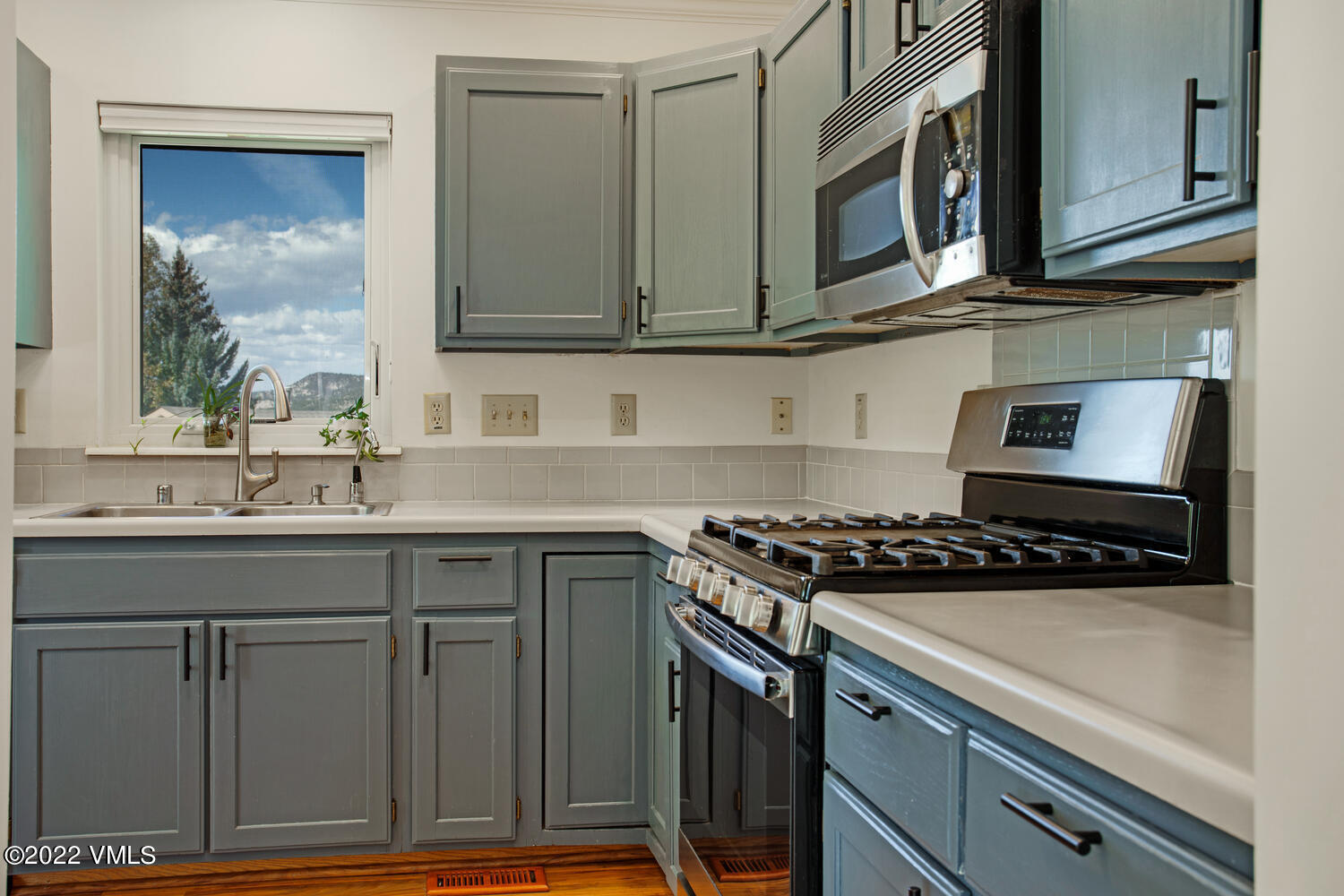 3 Canvas Back Eagle, CO 81631 - Photo 8 of 26 a kitchen with stainless steel appliances granite countertop a stove and a sink