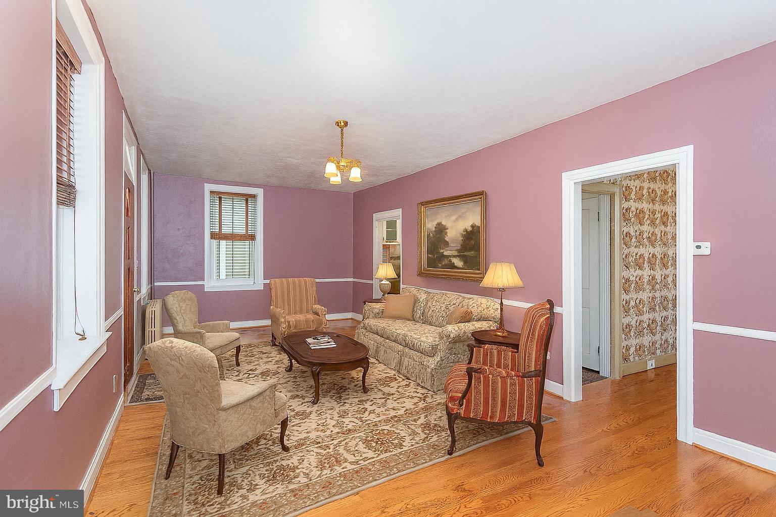 407 East Derry Road Hershey, PA 17033 - Photo 11 of 48 a living room with furniture and a wooden floor
