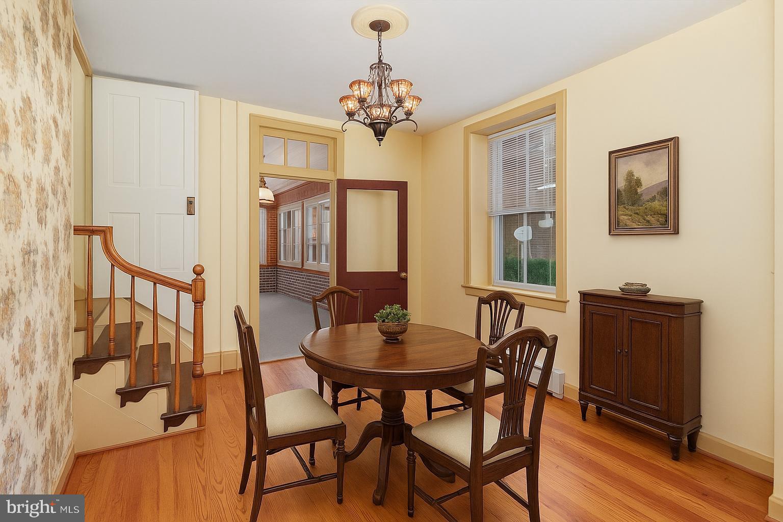 407 East Derry Road Hershey, PA 17033 - Photo 13 of 48 a view of a dining room with furniture and chandelier