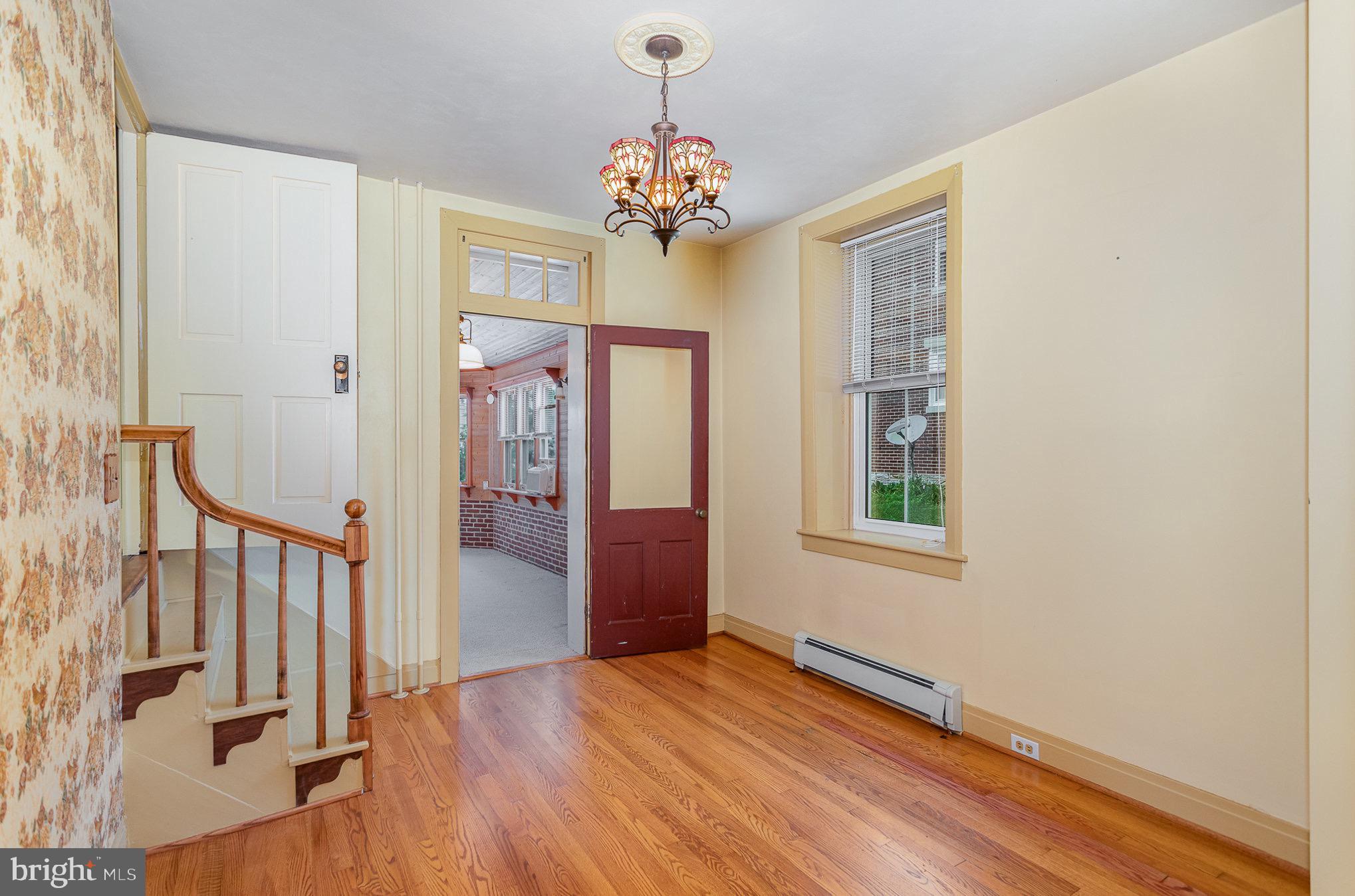 407 East Derry Road Hershey, PA 17033 - Photo 14 of 48 wooden floor in an empty room with a window