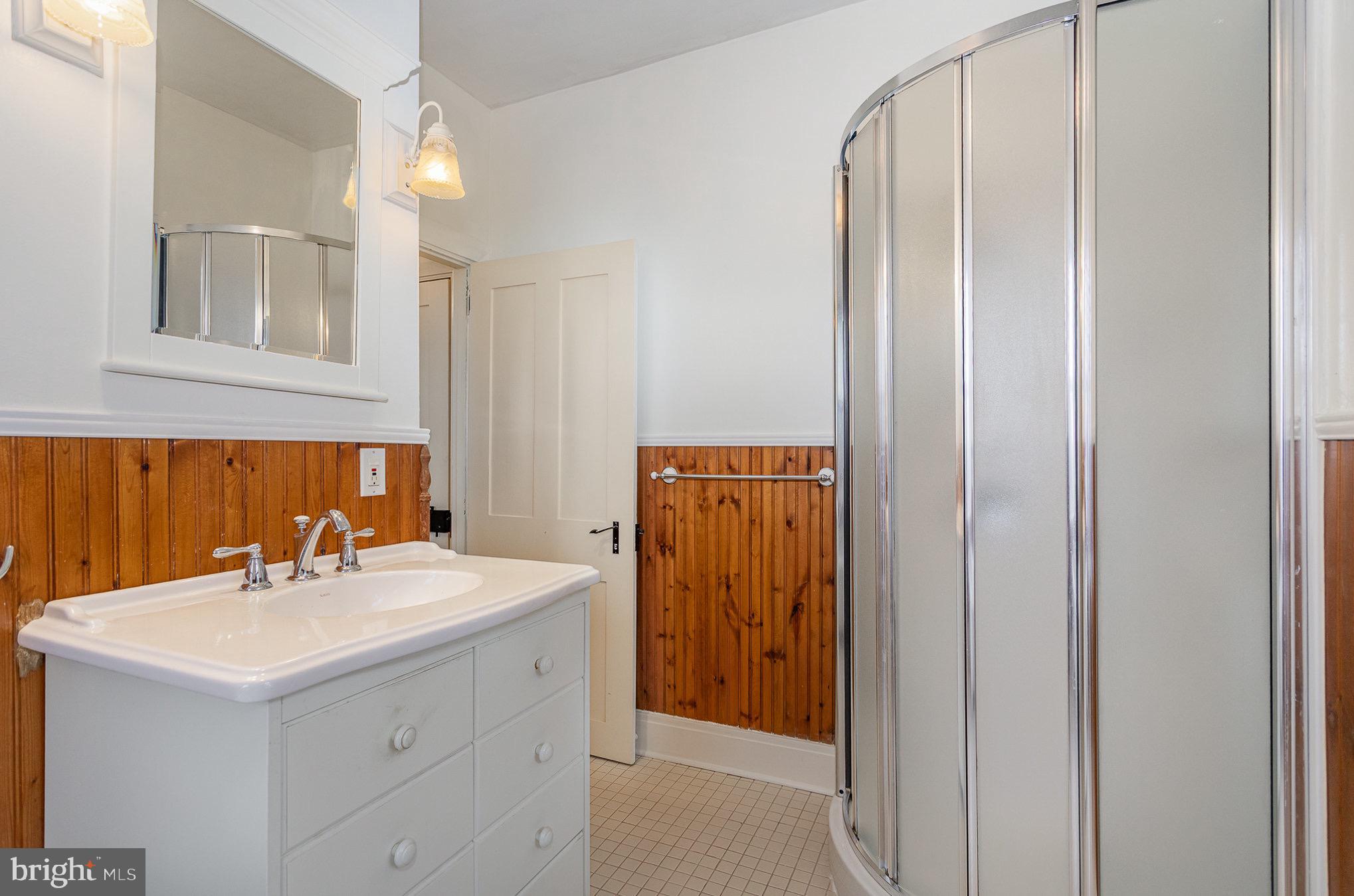 407 East Derry Road Hershey, PA 17033 - Photo 23 of 48 a bathroom with a sink and a mirror