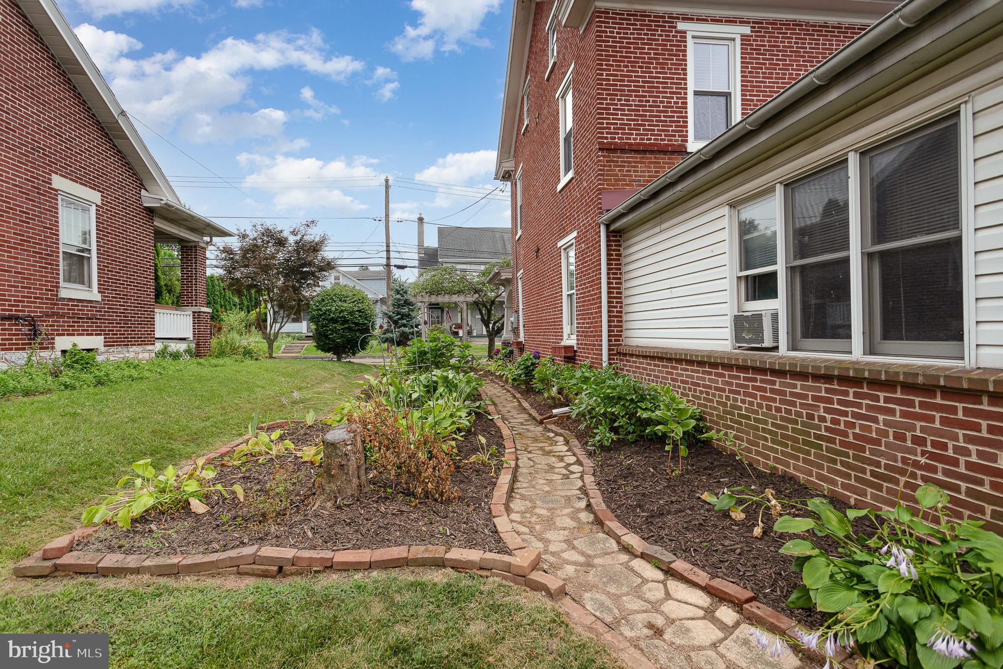 407 East Derry Road Hershey, PA 17033 - Photo 35 of 48 a view of a pathway with a house