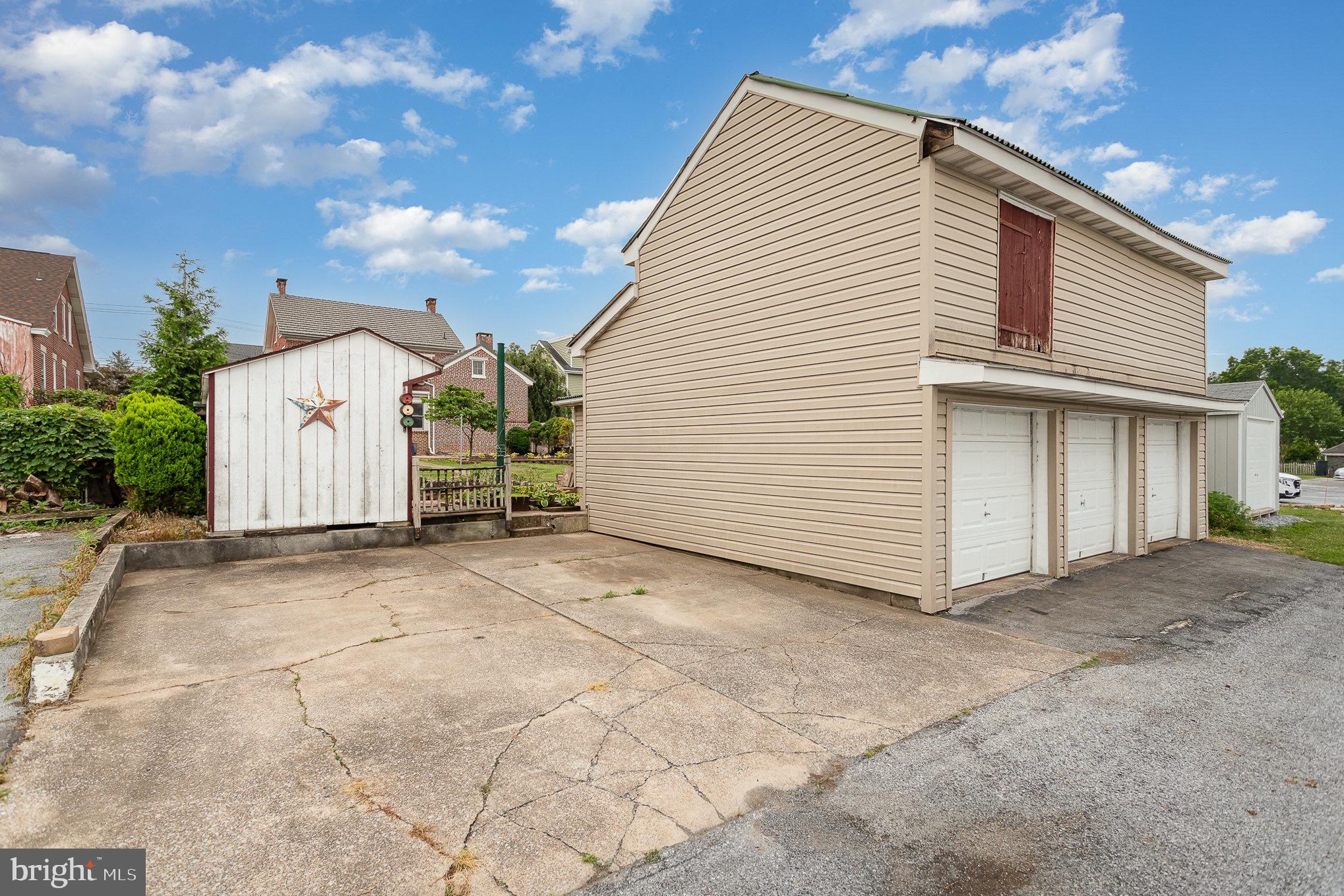 407 East Derry Road Hershey, PA 17033 - Photo 38 of 48 a view of a house with a backyard