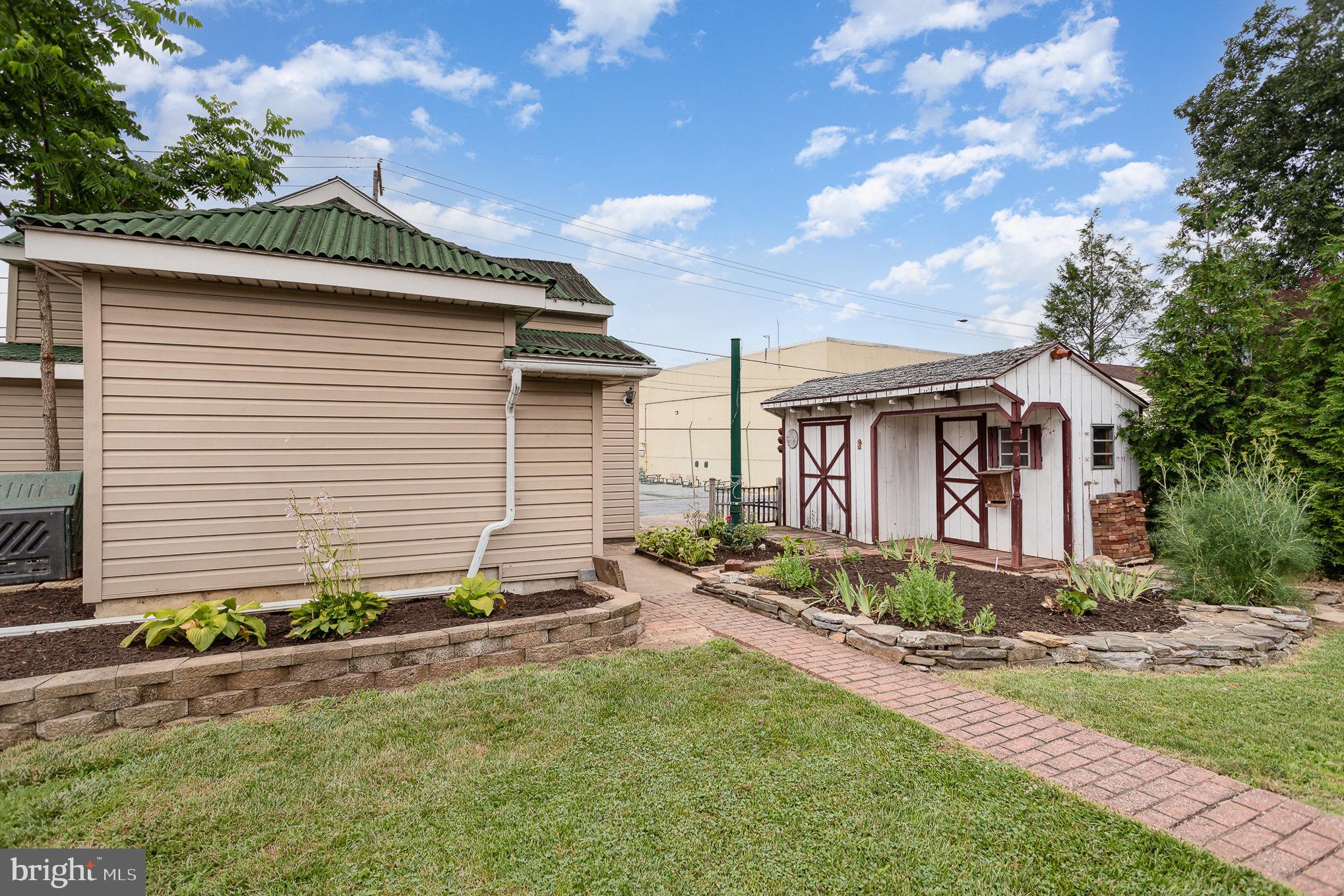 407 East Derry Road Hershey, PA 17033 - Photo 39 of 48 a front view of house with yard and green space