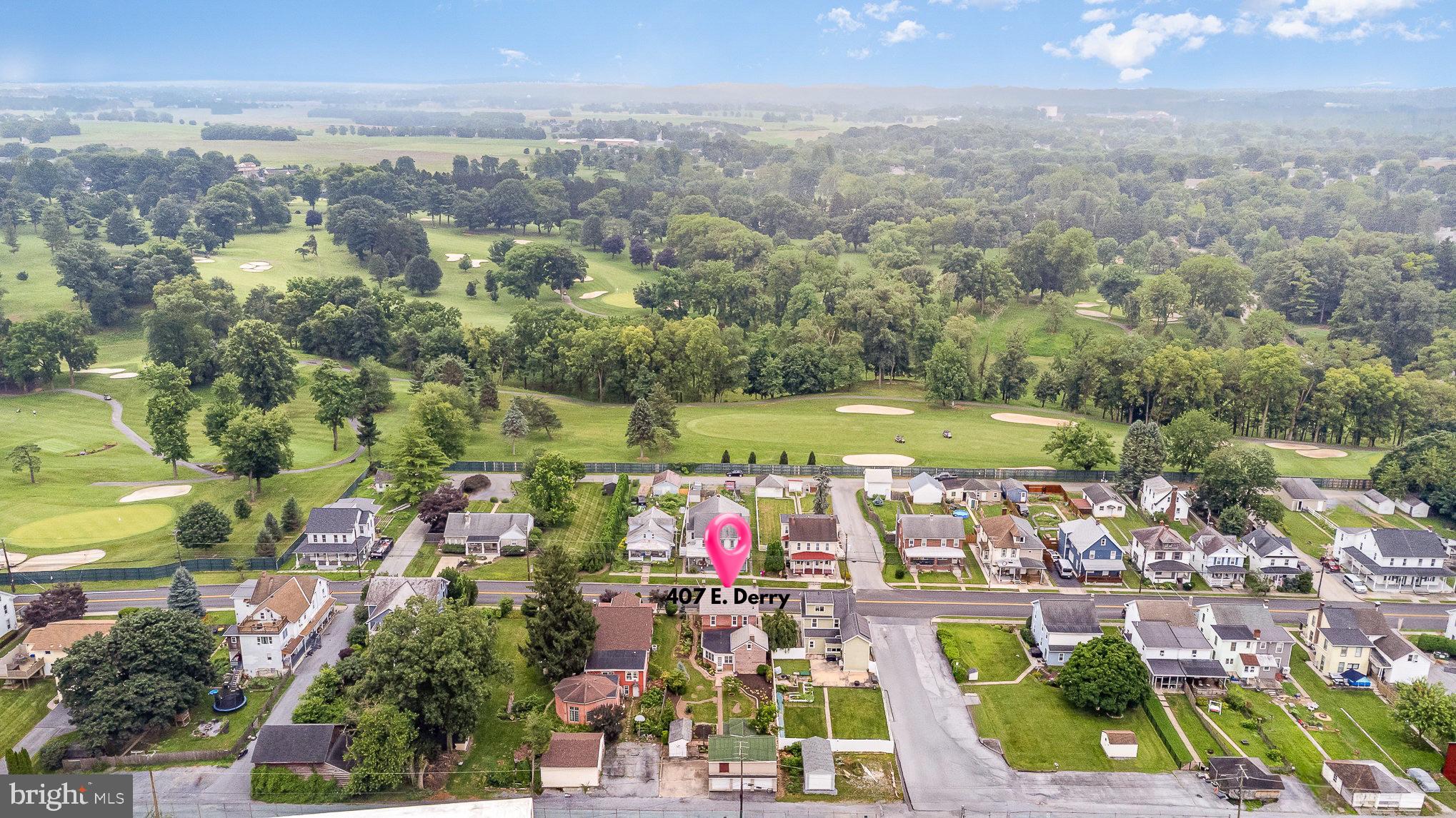 407 East Derry Road Hershey, PA 17033 - Photo 4 of 48 an aerial view of residential houses with outdoor space and swimming pool