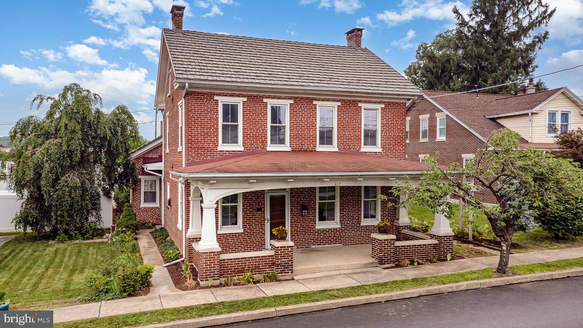 407 East Derry Road Hershey, PA 17033 - Photo 42 of 48 a front view of a house with a yard