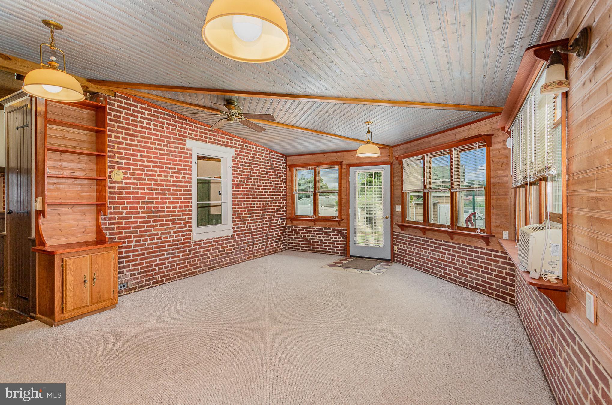 407 East Derry Road Hershey, PA 17033 - Photo 6 of 48 a view of an empty room and window