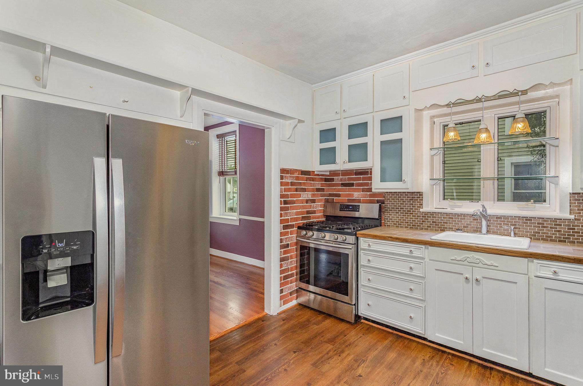 407 East Derry Road Hershey, PA 17033 - Photo 7 of 48 a kitchen with stainless steel appliances granite countertop a refrigerator and a sink