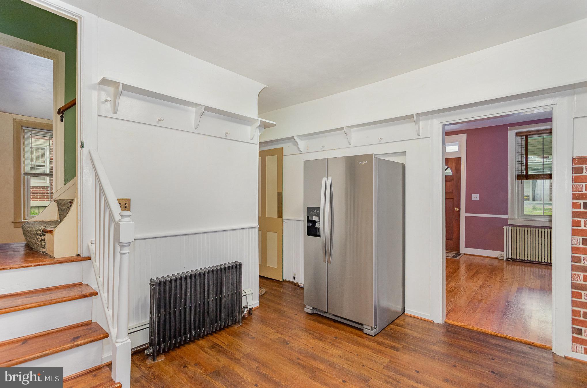 407 East Derry Road Hershey, PA 17033 - Photo 9 of 48 a view of a livingroom with wooden floor and staircase