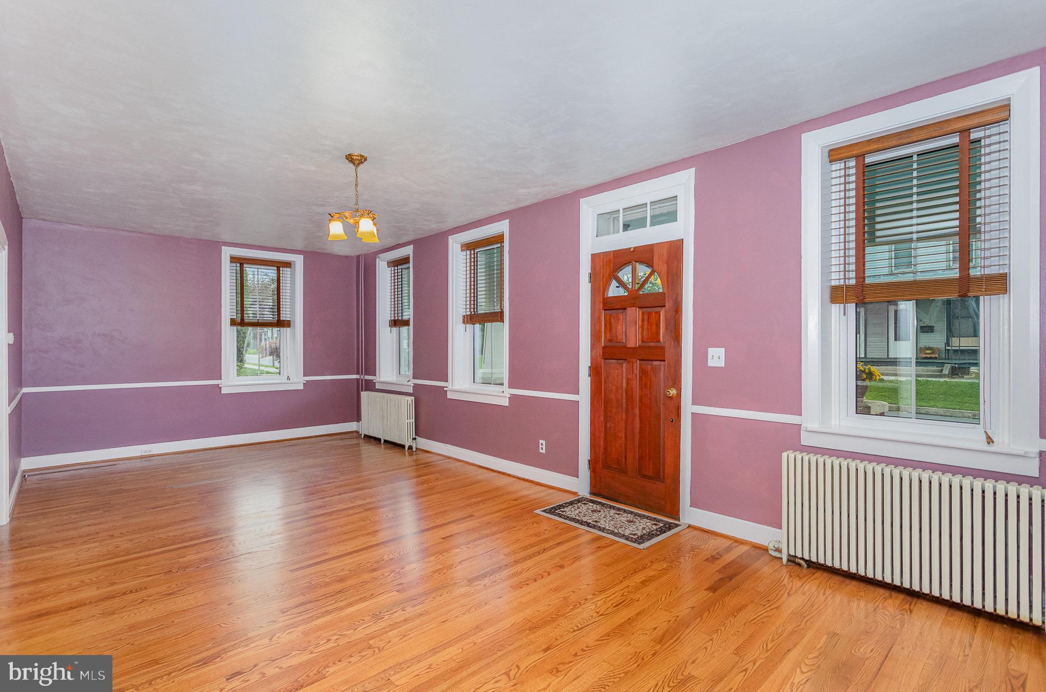 407 East Derry Road Hershey, PA 17033 - Photo 10 of 48 a view of an empty room with window and wooden floor