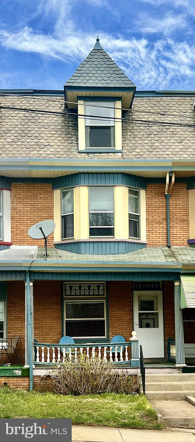 349 Chestnut Street West Reading, PA 19611 - Photo 1 of 23 a front view of a house with garden