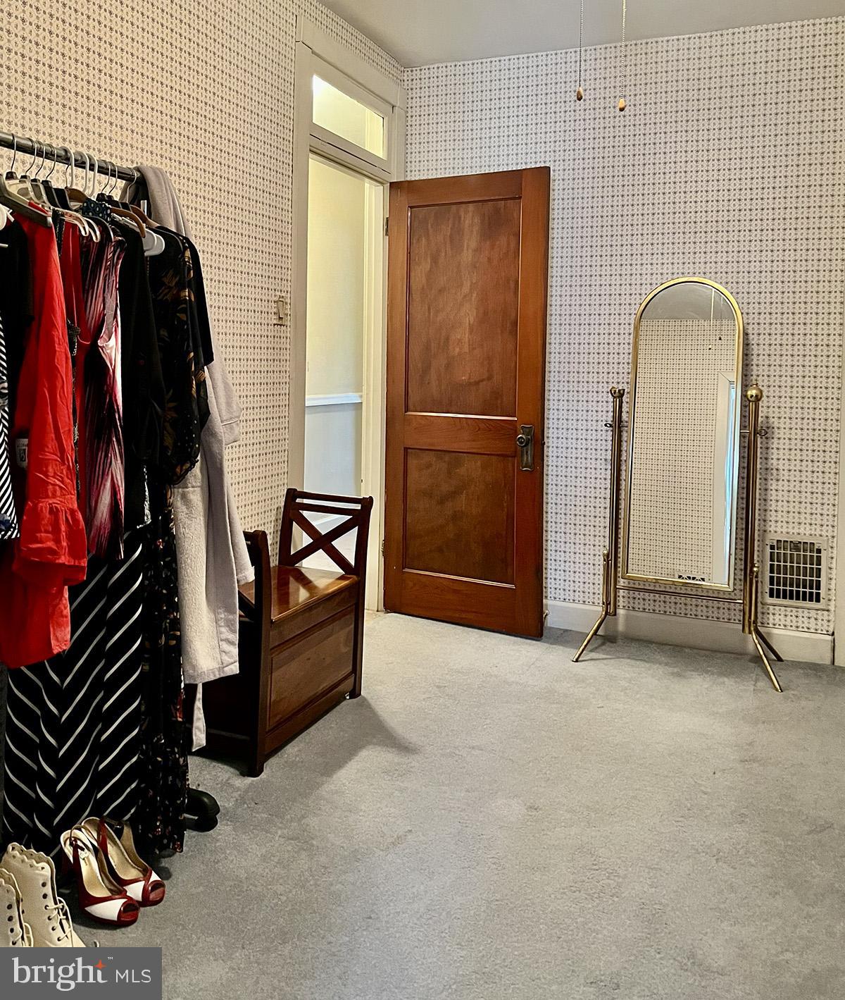 349 Chestnut Street West Reading, PA 19611 - Photo 16 of 23 a view of walk in closet with clothes and shoes