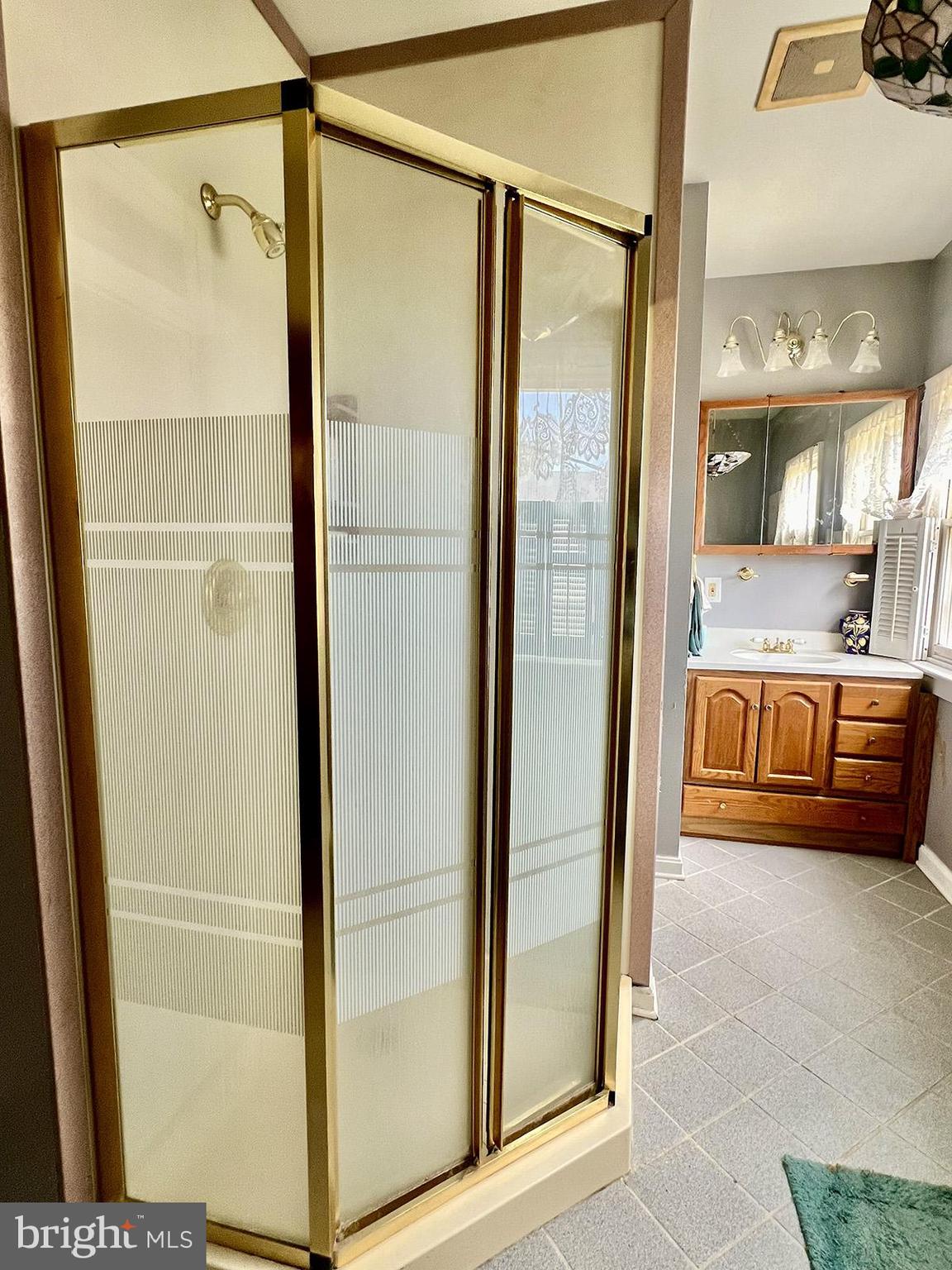 349 Chestnut Street West Reading, PA 19611 - Photo 18 of 23 a view of en suite bathroom with a glass shower door