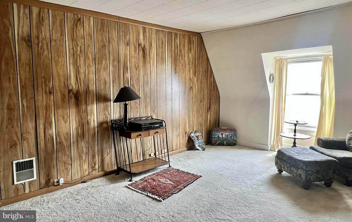 349 Chestnut Street West Reading, PA 19611 - Photo 20 of 23 a living room with furniture and a rug