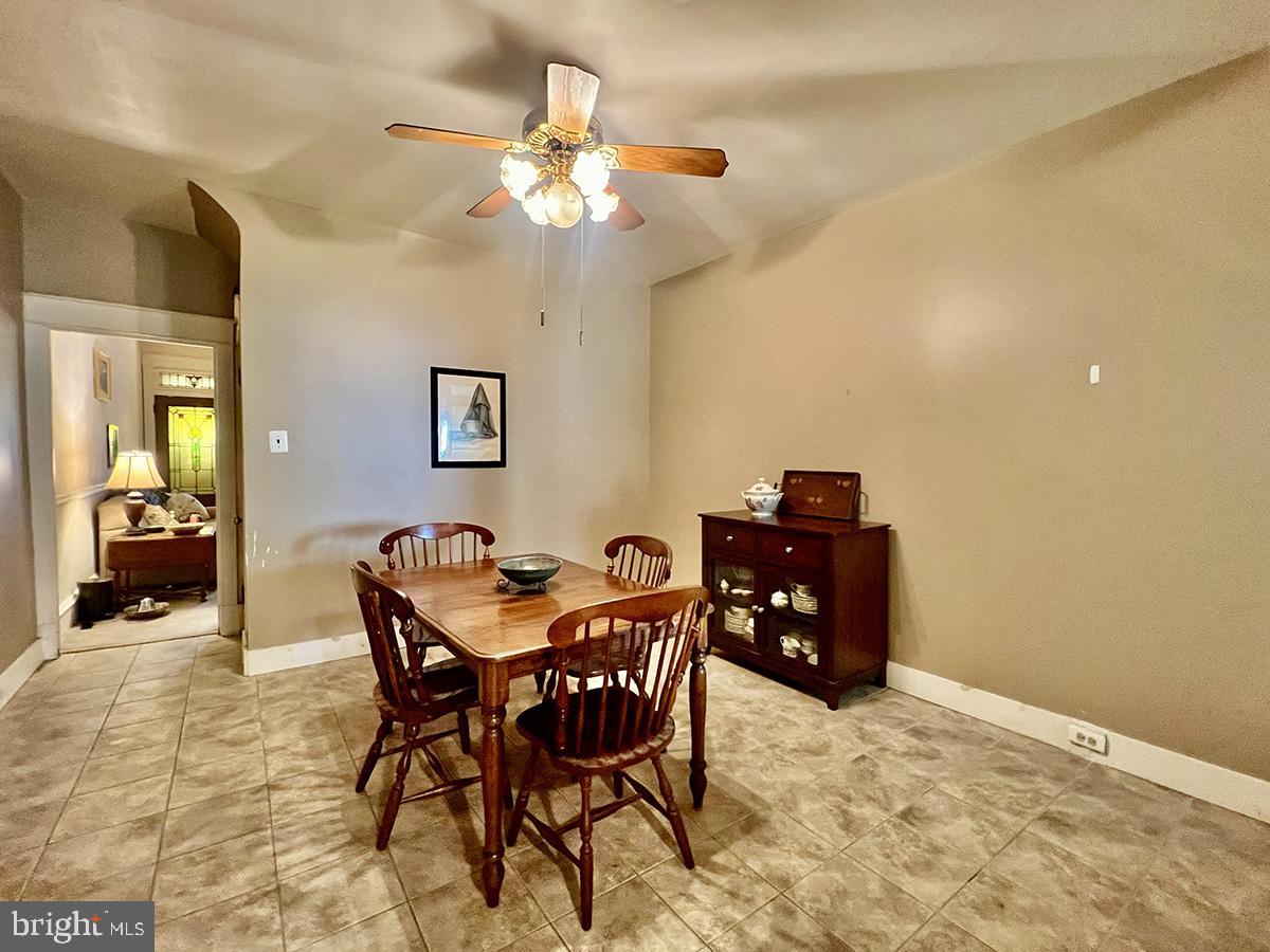 349 Chestnut Street West Reading, PA 19611 - Photo 8 of 23 a view of a dining room with furniture and chandelier