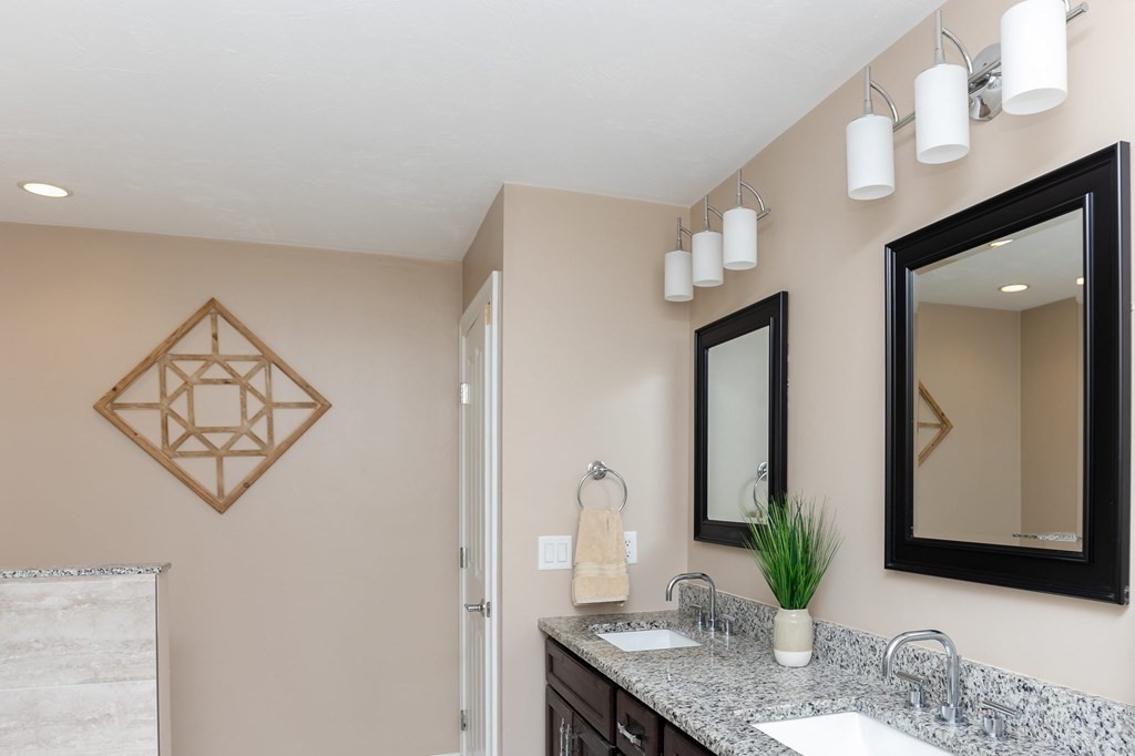 7 Pond Edge Trail Wareham, MA 02571 - Photo 20 of 30 a bathroom with a granite countertop sink and a mirror