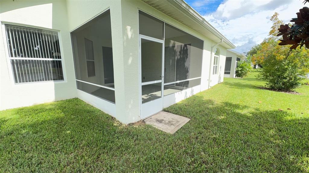 21 Raintree Circle Palm Coast, FL 32164 - Photo 9 of 10 a view of backyard of a house