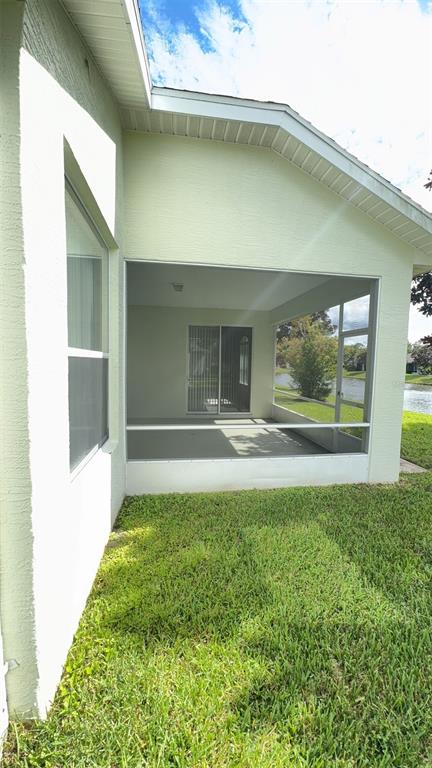 21 Raintree Circle Palm Coast, FL 32164 - Photo 10 of 10 a front view of a house with garden