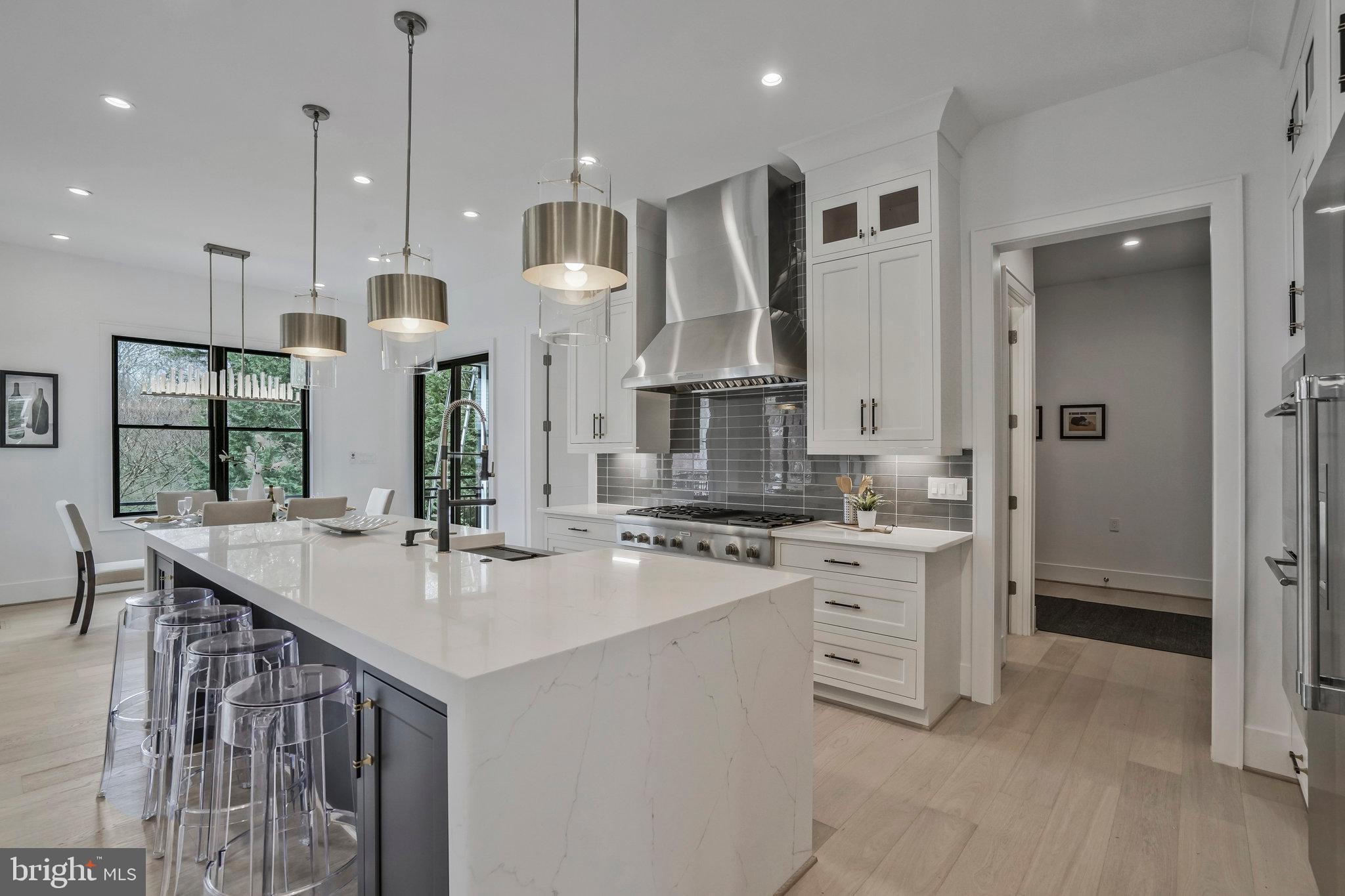 1426 Cola Drive McLean, VA 22101 - Photo 23 of 73 2-tiered wall cabinets with under mount cabinet