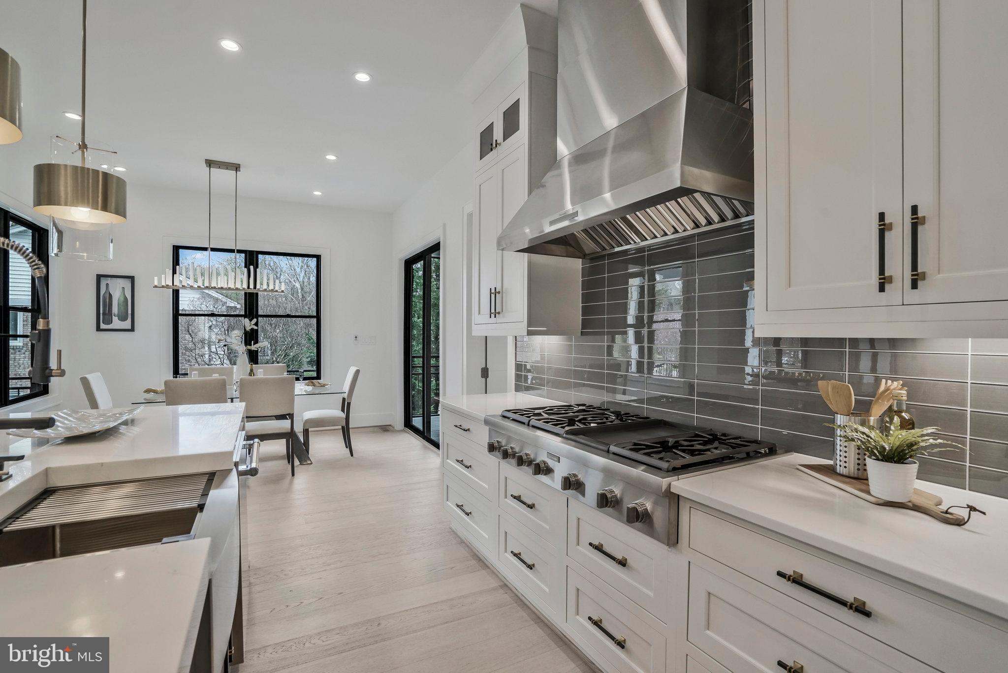 1426 Cola Drive McLean, VA 22101 - Photo 24 of 73 main kitchen with 6-burner gas stovetop and hood