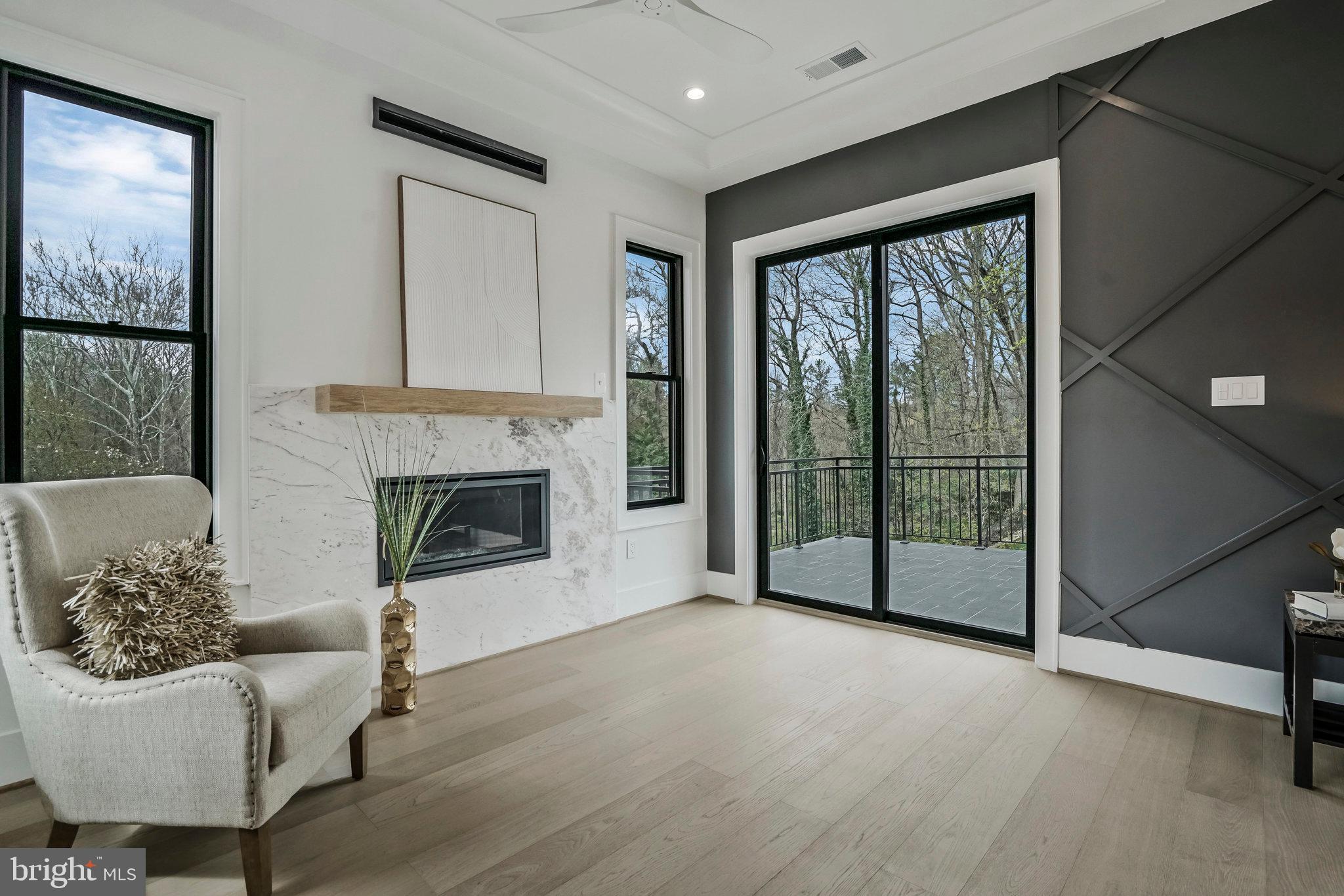 1426 Cola Drive McLean, VA 22101 - Photo 43 of 73 Gas fireplace w/ marble wall w/ built-in mantel