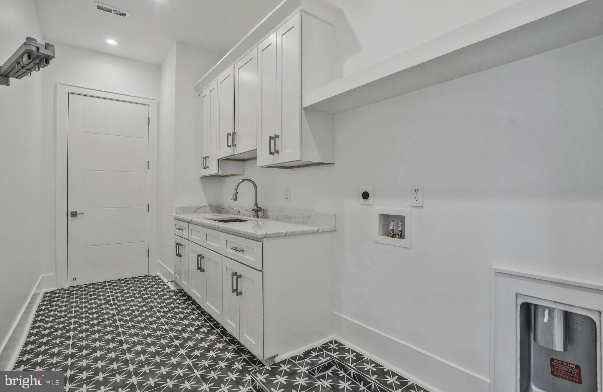 1426 Cola Drive McLean, VA 22101 - Photo 51 of 73 Laundry room w/ Washer and dryer hookups