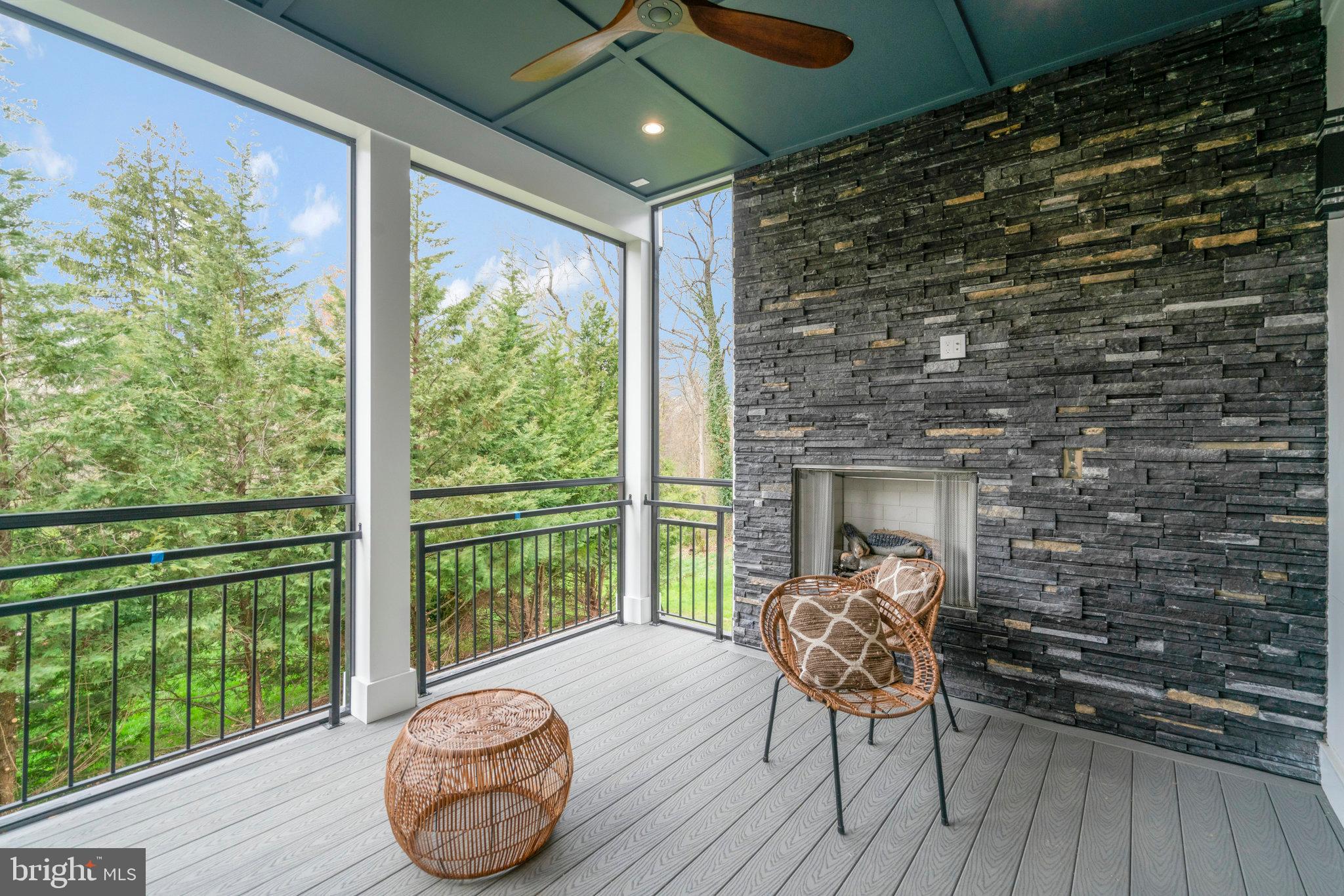 1426 Cola Drive McLean, VA 22101 - Photo 67 of 73 Rear Covered deck with flag stone pavers