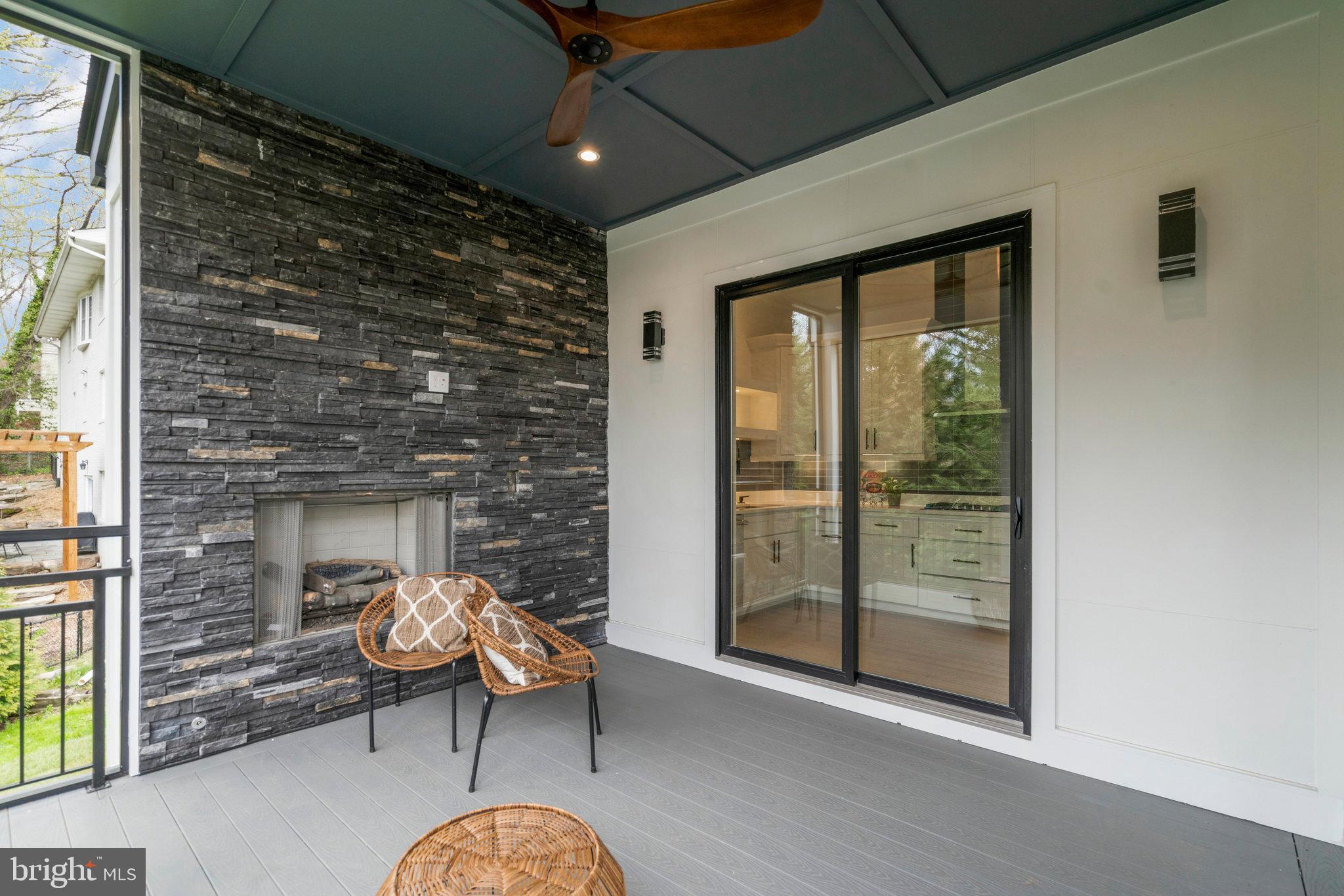 1426 Cola Drive McLean, VA 22101 - Photo 68 of 73 Rear Covered deck with flag stone pavers