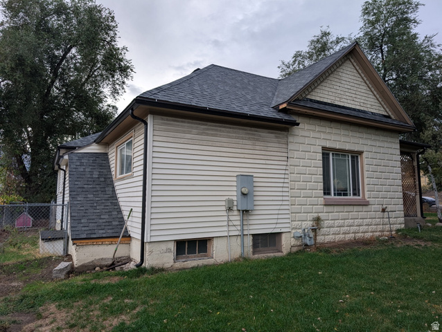 1341 East Crk Road Sandy, UT 84093 - Photo 5 of 24 View of home's exterior with a shingled roof
