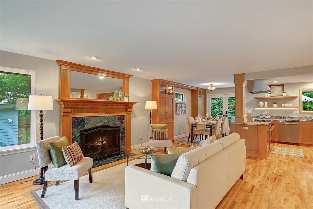 310 175th Place Southwest Bothell, WA 98012 - Photo 3 of 40 a living room with furniture fireplace and large windows