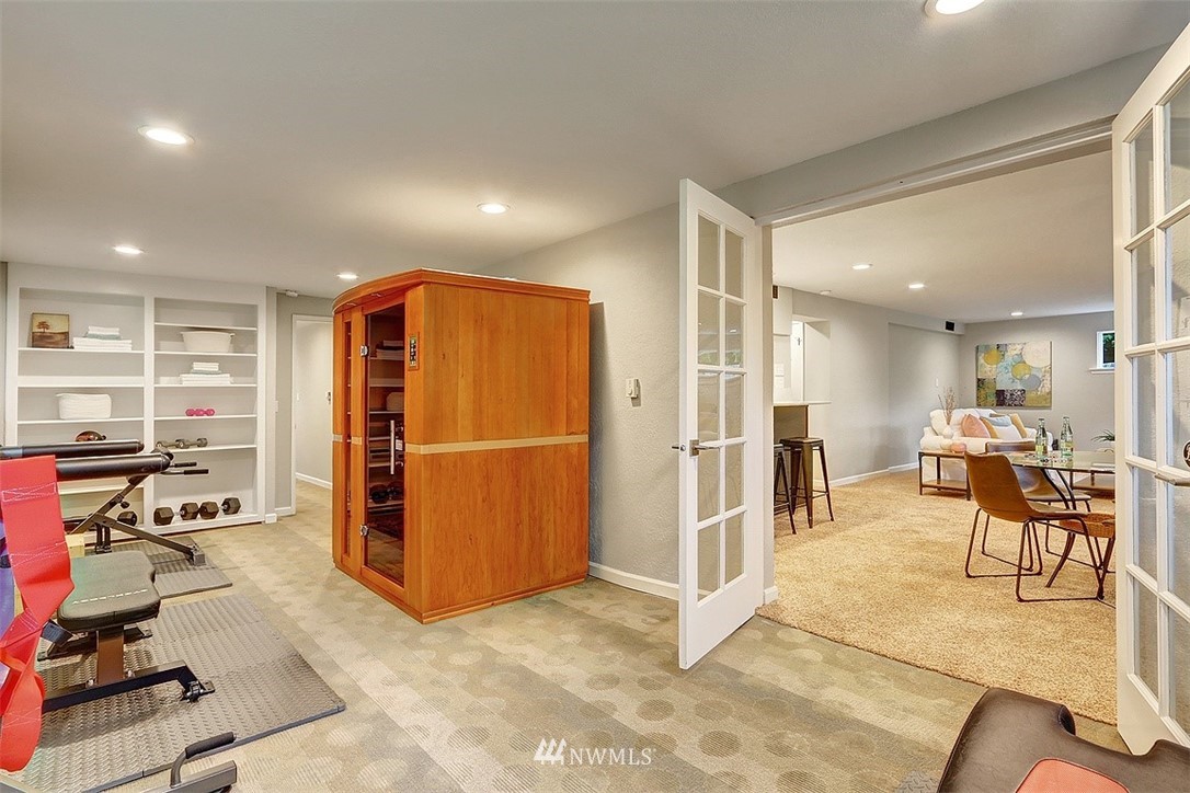 310 175th Place Southwest Bothell, WA 98012 - Photo 22 of 40 a view of a livingroom with table and chairs