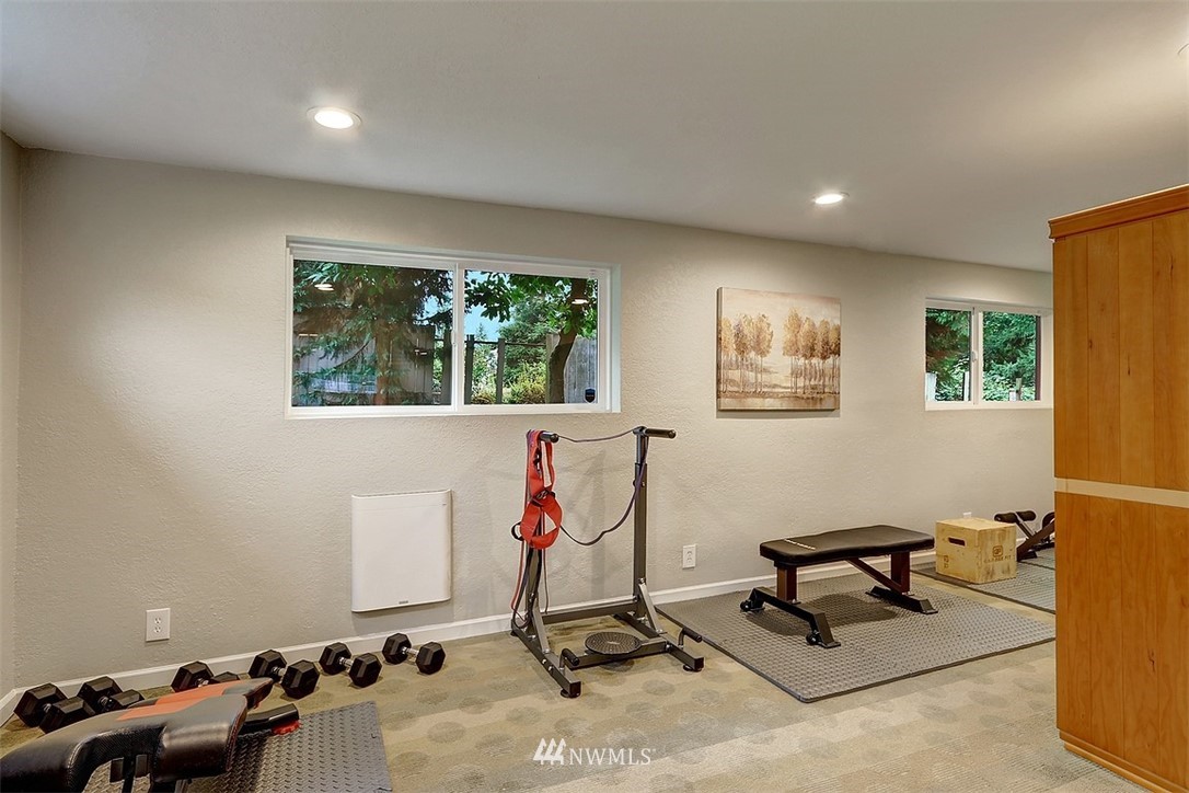 310 175th Place Southwest Bothell, WA 98012 - Photo 23 of 40 a room with gym equipment and a window