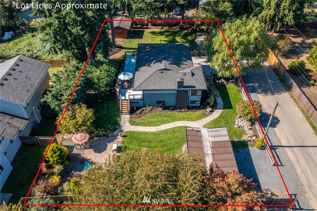 310 175th Place Southwest Bothell, WA 98012 - Photo 36 of 40 an aerial view of house with yard swimming pool and outdoor seating