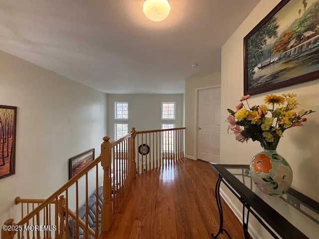 a view of entryway with wooden floor