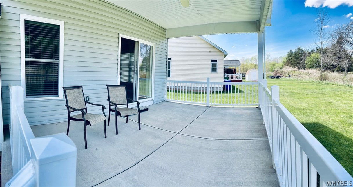 28 Willow Wind Trail Ogden, NY 14624 - Photo 7 of 38 Spacious deck with sliding doors to dining area