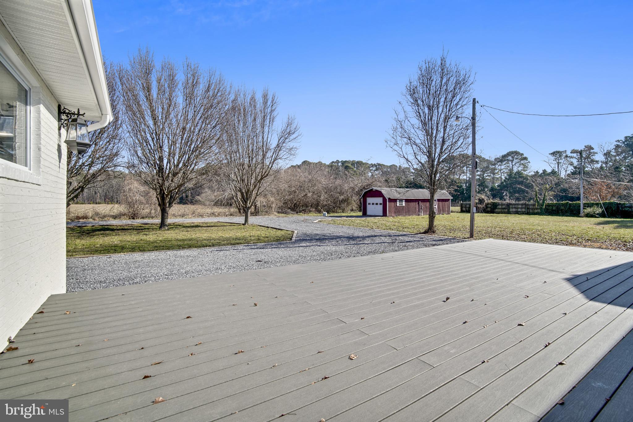 48777 Carvels Way Ridge, MD 20680 - Photo 31 of 35 Front Exterior view of circular driveway and Shed