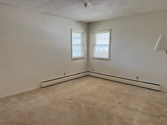 a view of a room with rack on the wall