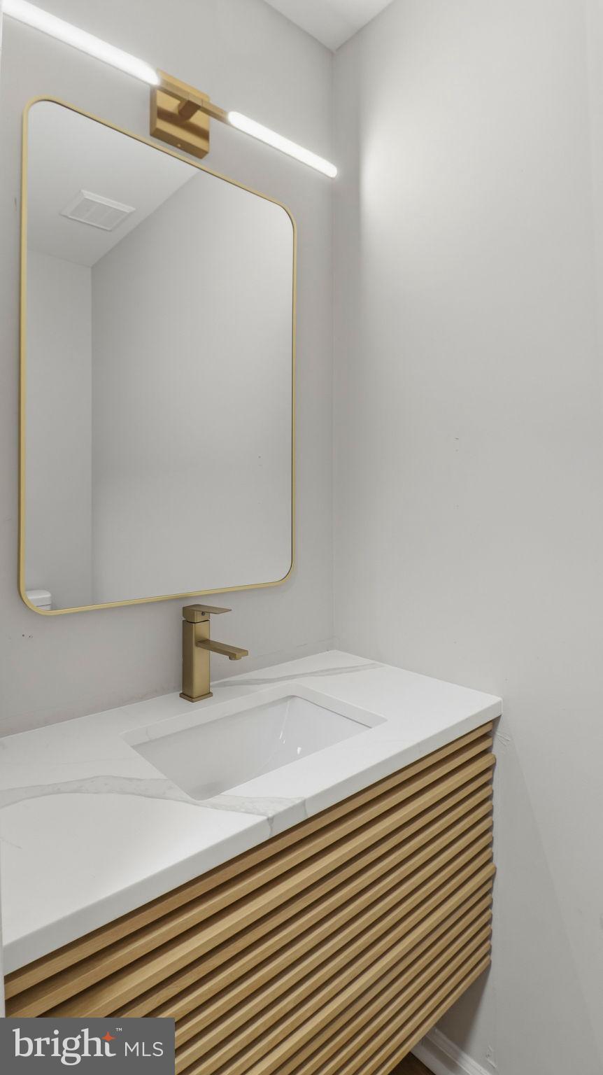 5106 Tall Pines Pine Hill, NJ 08021 - Photo 18 of 35 Sleek modern bathroom with elegant fixtures.