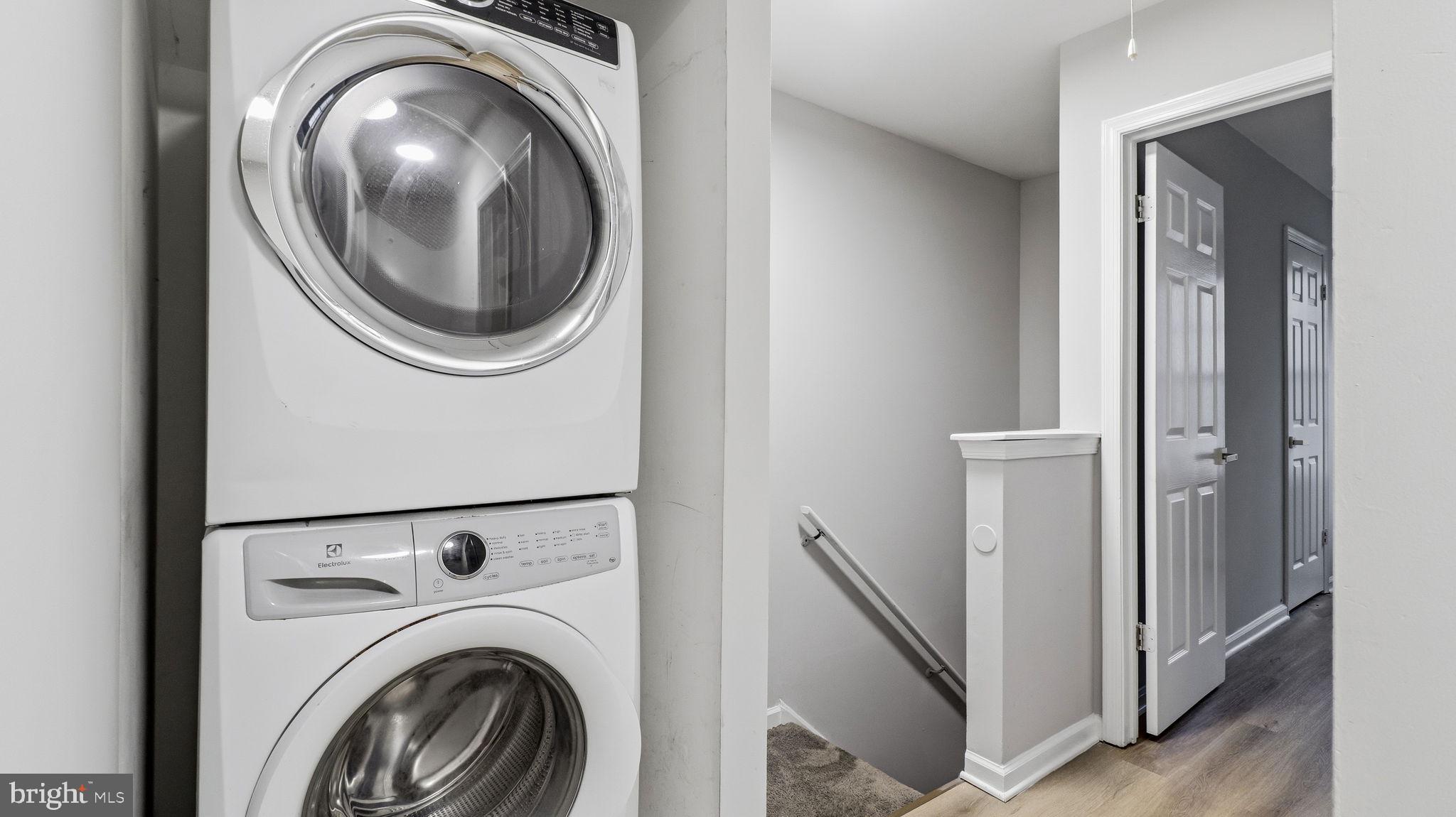 5106 Tall Pines Pine Hill, NJ 08021 - Photo 21 of 35 Modern laundry nook with sleek appliances.