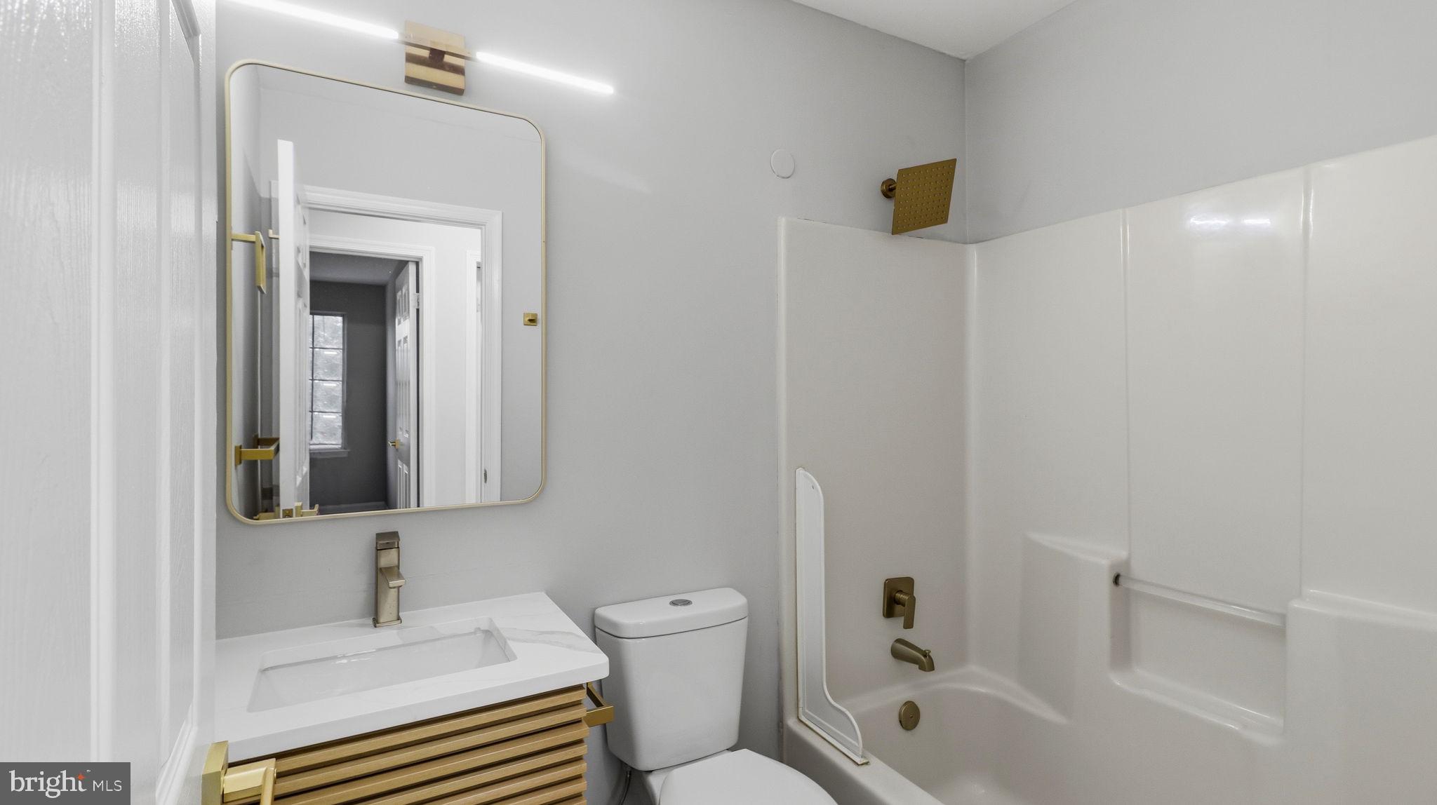 5106 Tall Pines Pine Hill, NJ 08021 - Photo 25 of 35 Sleek modern Guest bathroom with elegant accents.