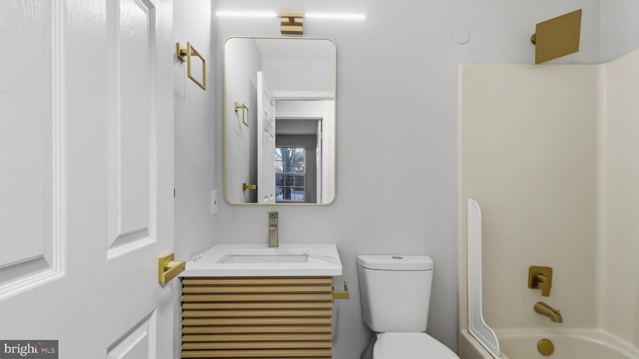 5106 Tall Pines Pine Hill, NJ 08021 - Photo 26 of 35 Sleek Guest bathroom with modern accents.