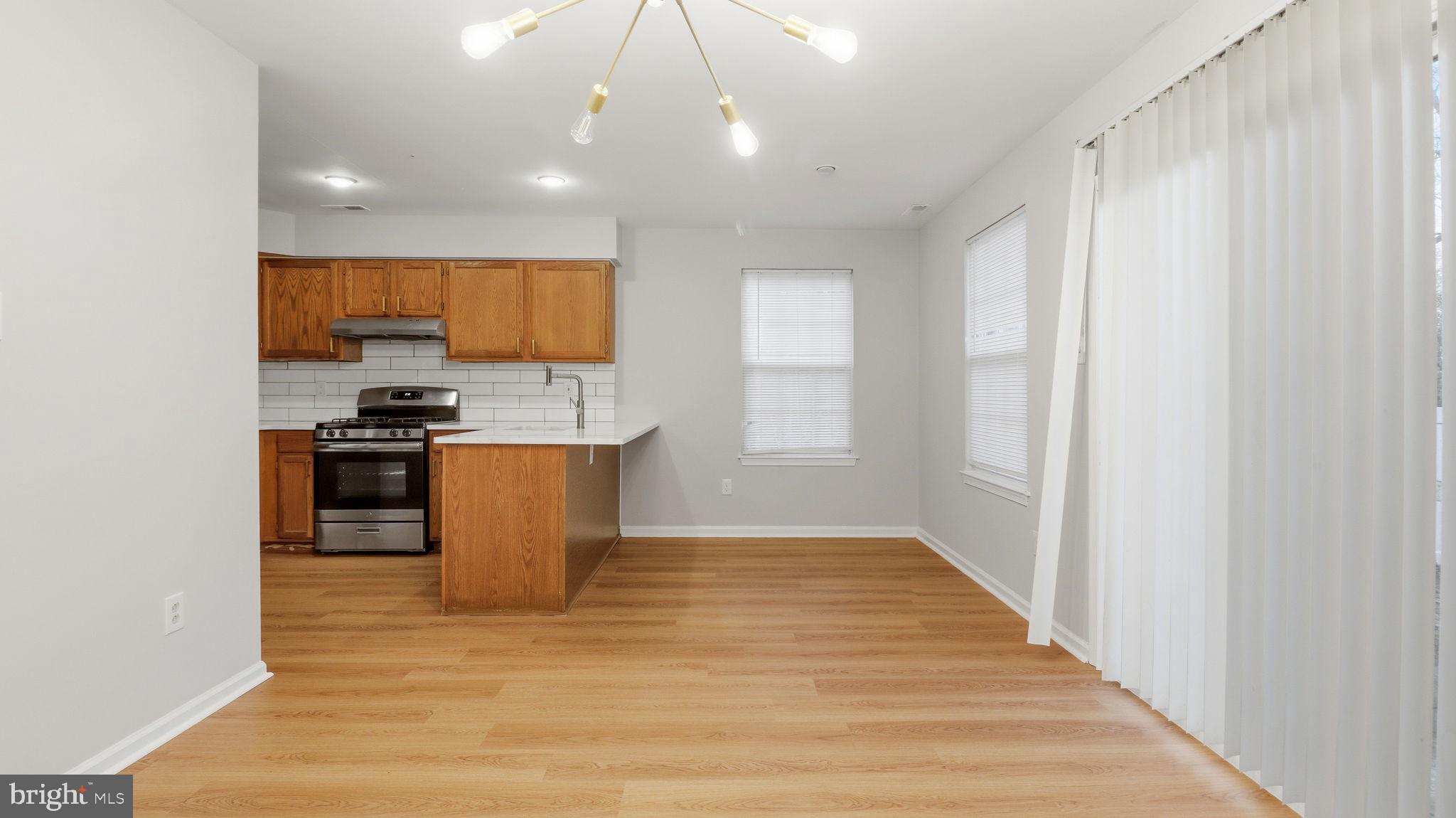 5106 Tall Pines Pine Hill, NJ 08021 - Photo 10 of 35 Modern kitchen with natural light.