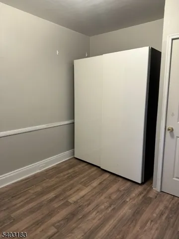 a kitchen with a stove microwave and a window